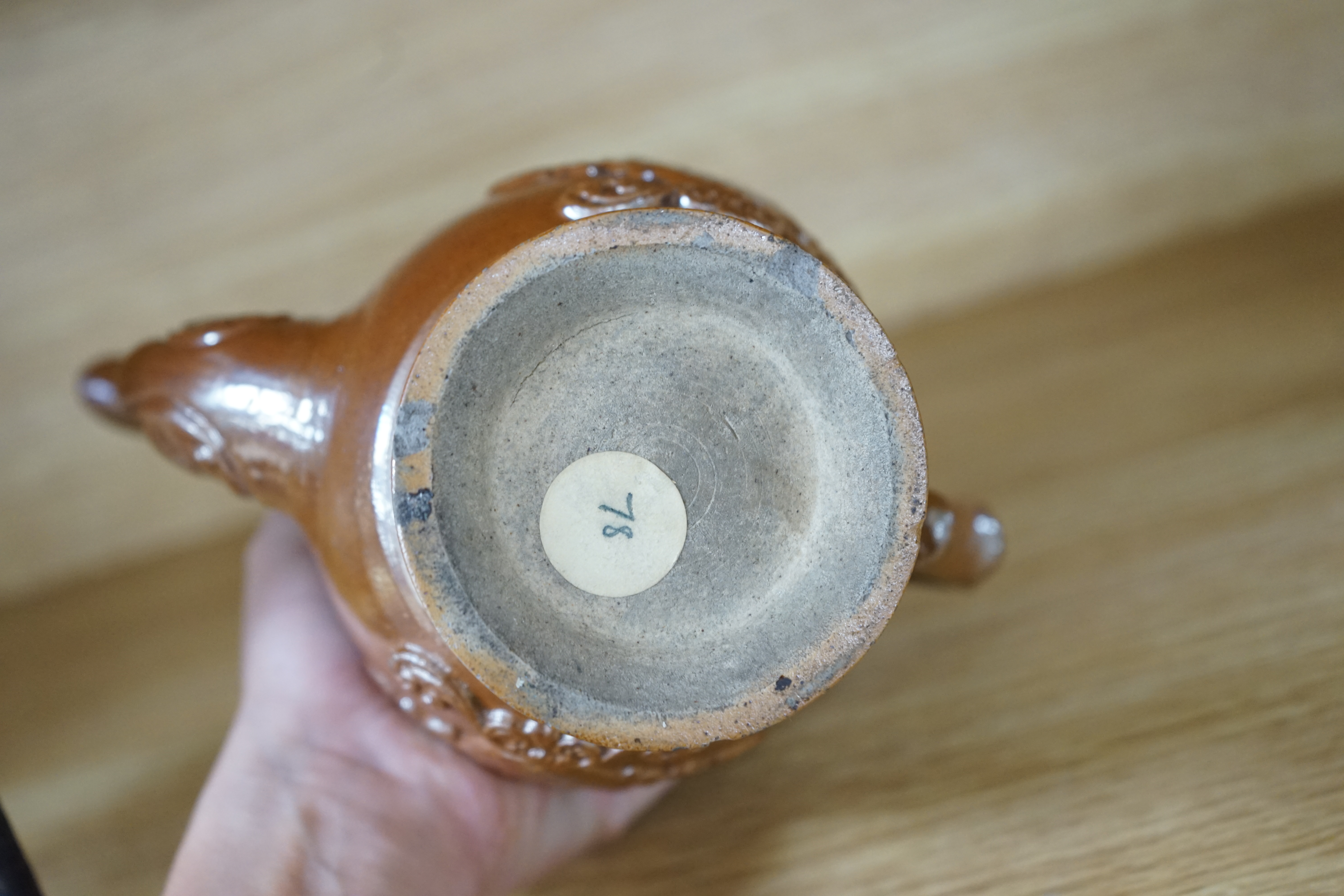 A Derbyshire salt-glaze coffee pot, 21cm high. Condition - fair, two significant chips to lid and other minor chipping.